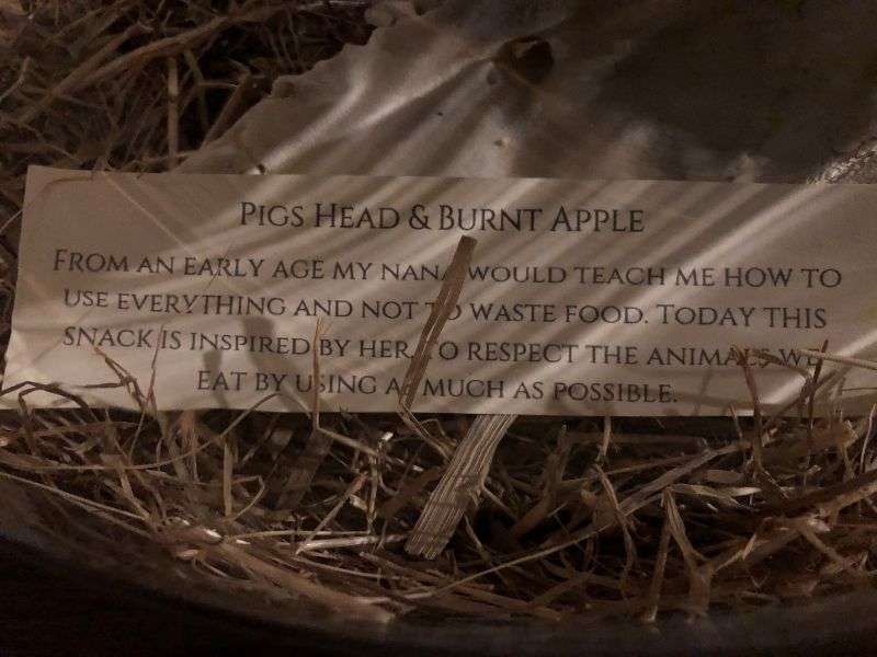 The note that accompanies the pig’s head snack