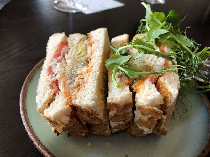 Crab club sandwich, avocado, tomato and chilli