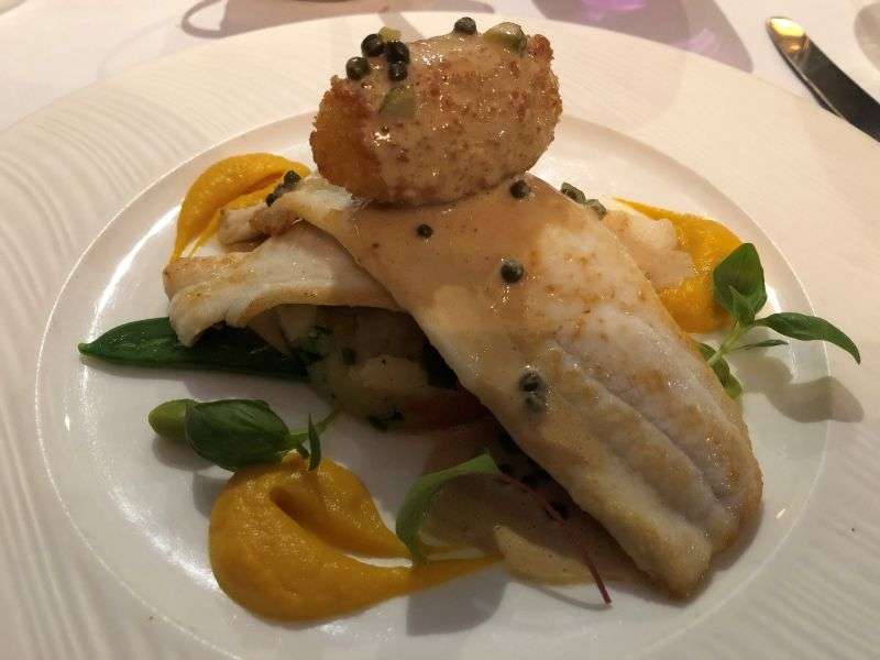 The main course of grilled fillet of plaice The main course of grilled fillet of plaice