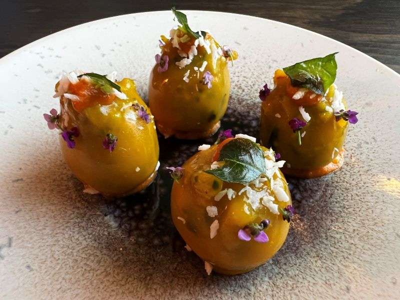 Snacks of spiced crab in a mango chutney shell Snacks of spiced crab in a mango chutney shell