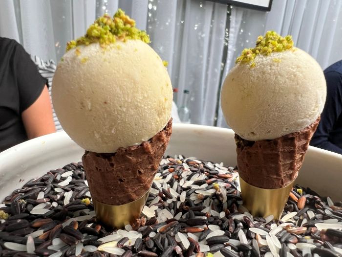 Pistachio ice cream served in a cone Pistachio ice cream served in a cone