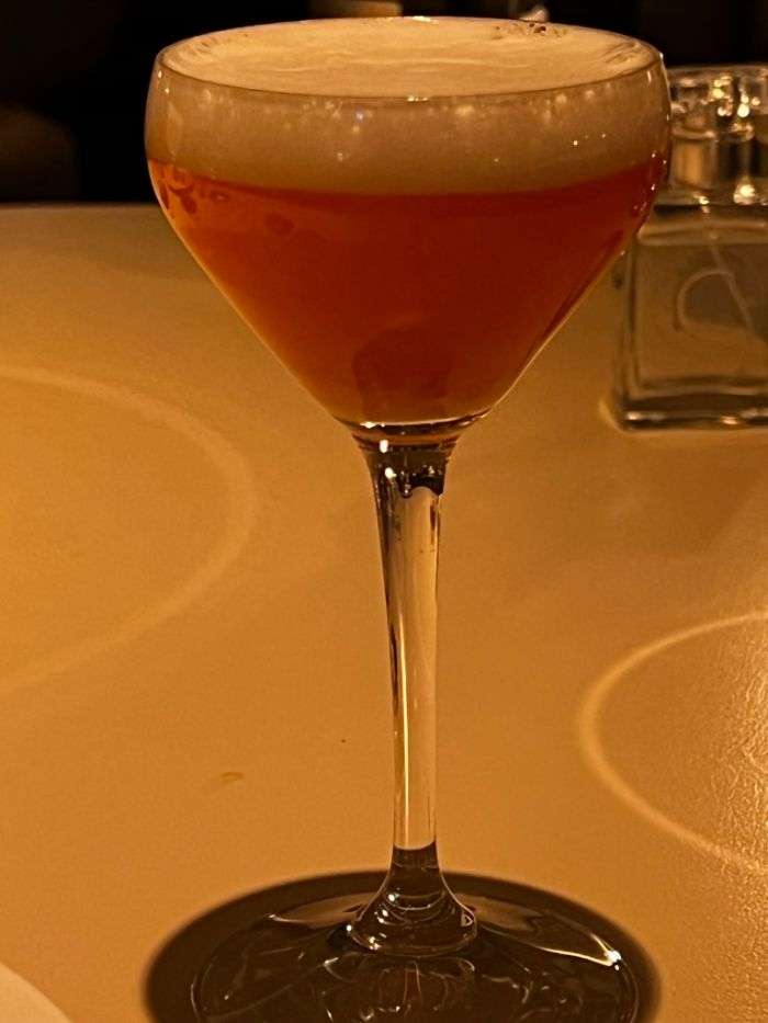 Cocktail of fresh carrot, a honey and cicely liqueur Cocktail of fresh carrot, a honey and cicely liqueur