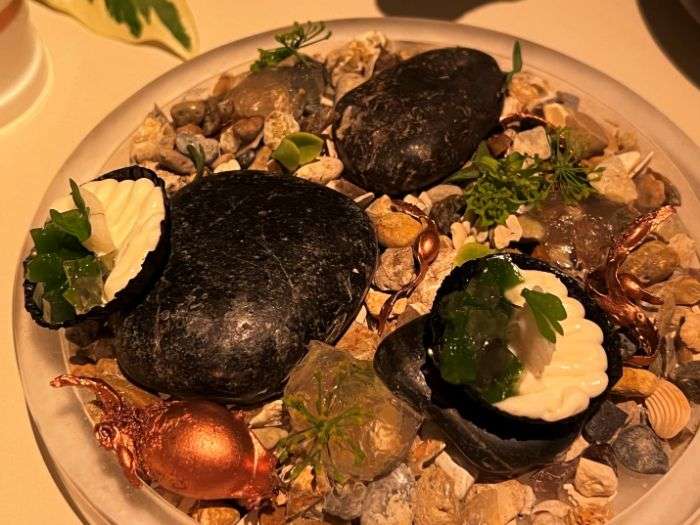 Jellied eel, toasted seaweed and malt vinegar canape Jellied eel, toasted seaweed and malt vinegar canape