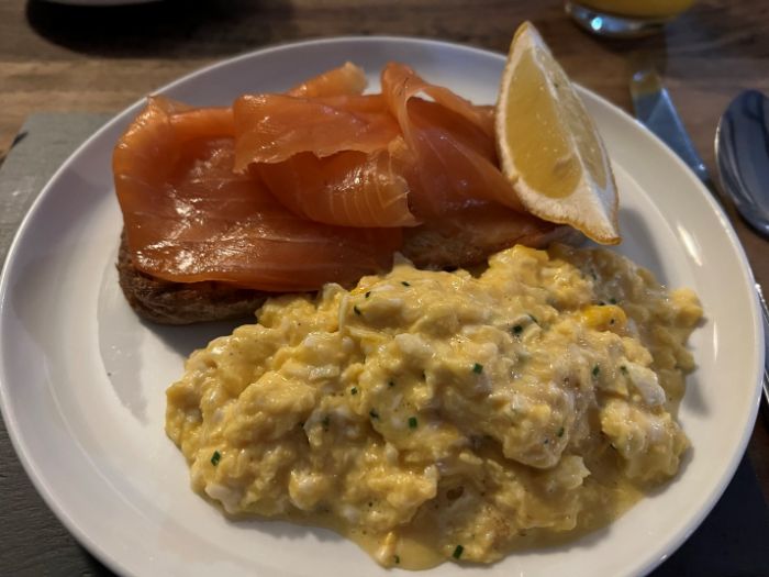 Breakfast of smoked salmon with scrambled egg