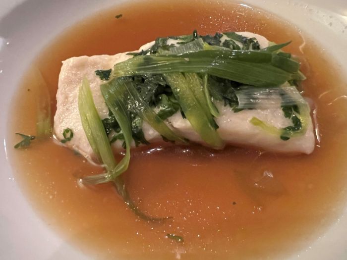 A starter of turbot with dashi broth A starter of turbot with dashi broth