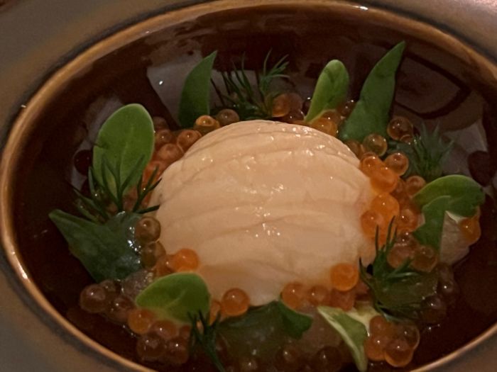 Tasting menu scallop with crème fraiche and trout roe