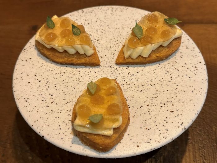 Canape of aged parmesan sable biscuit