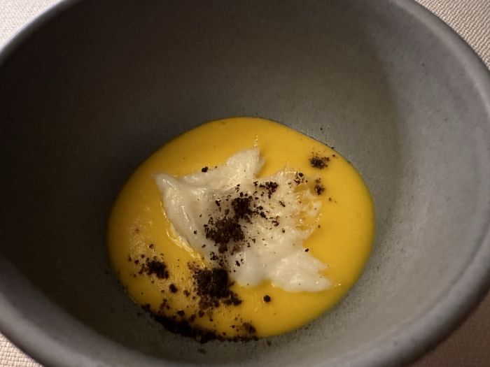 Cod on a sauce of carrot and pumpkin cream
