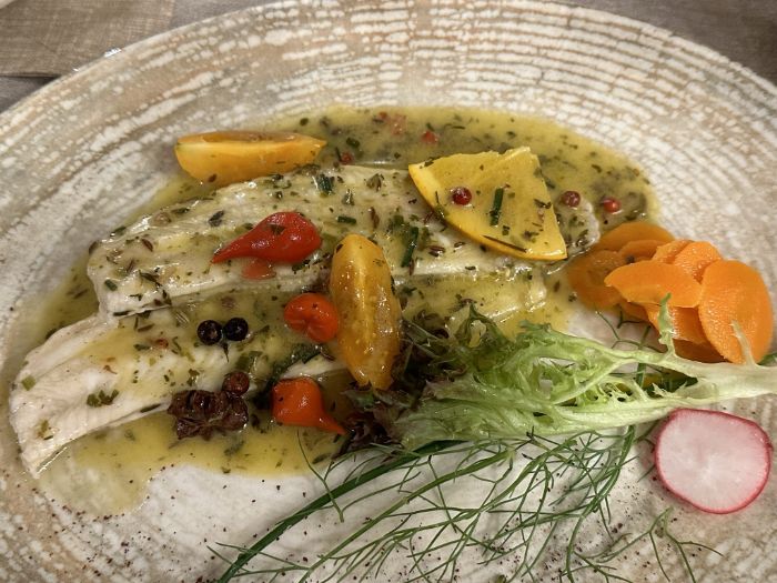 Sole fillet with citrus, spice and fine herb sauce