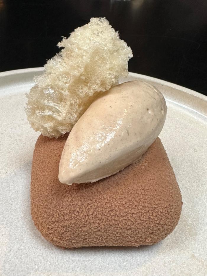 Dark chocolate entremet with malt, hazelnut and black garlic Dark chocolate entremet with malt, hazelnut and black garlic