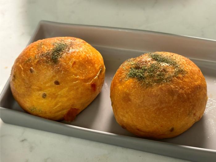 Brioche bread served with tagliolini pasta Brioche bread served with tagliolini pasta