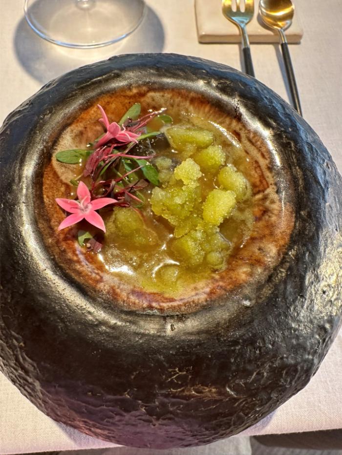 Dashi ceviche, rice vinegar broth and flowers Dashi ceviche, rice vinegar broth and flowers