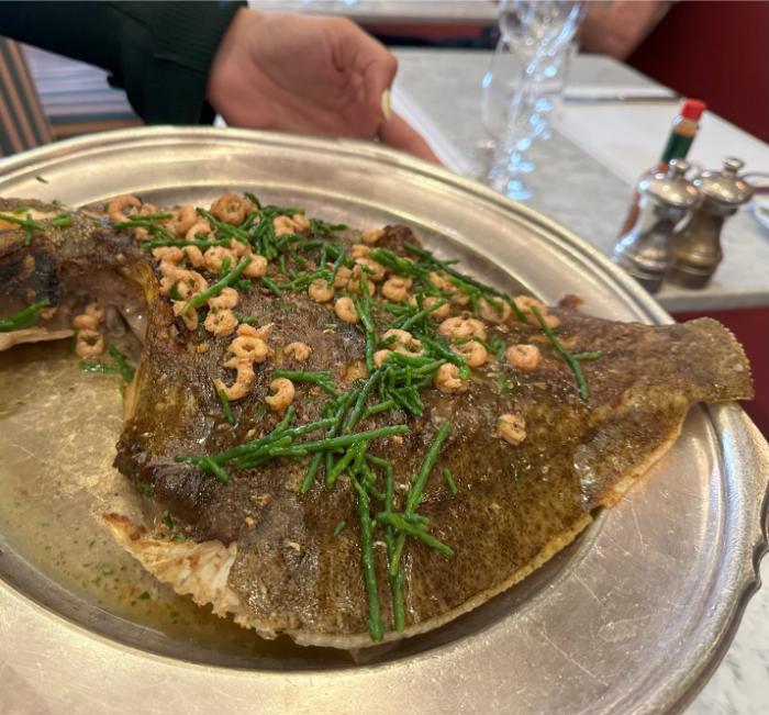 The turbot presented at the table before it was served The turbot presented at the table before it was served