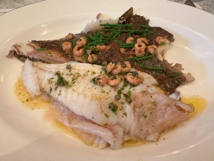 Fish on the plate after it was filleted at the table Fish on the plate after it was filleted at the table