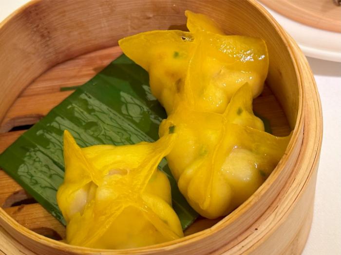 Atlantic sea scallop and mui choi dumpling Atlantic sea scallop and mui choi dumpling