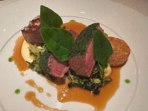 Main course of herb crusted loin of lamb