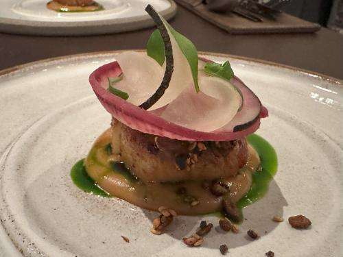 Orkney scallop, peanut satay, radish and coriander