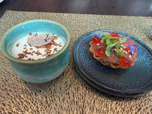 Espume canape (left) and tuna tartar tart (right