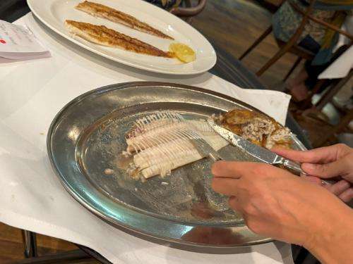 Whole Dover sole expertly filleted at the table