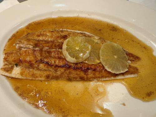 Whole Dover sole served meunière
