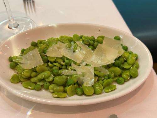Fresh garden peas and broad beans with Parmesan