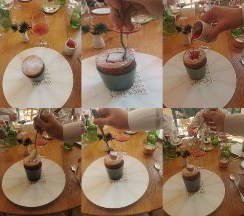 Serving the raspberry souffle Serving the raspberry souffle