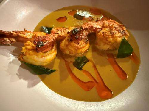 Large plate of Goan style tiger king prawns Large plate of Goan style tiger king prawns