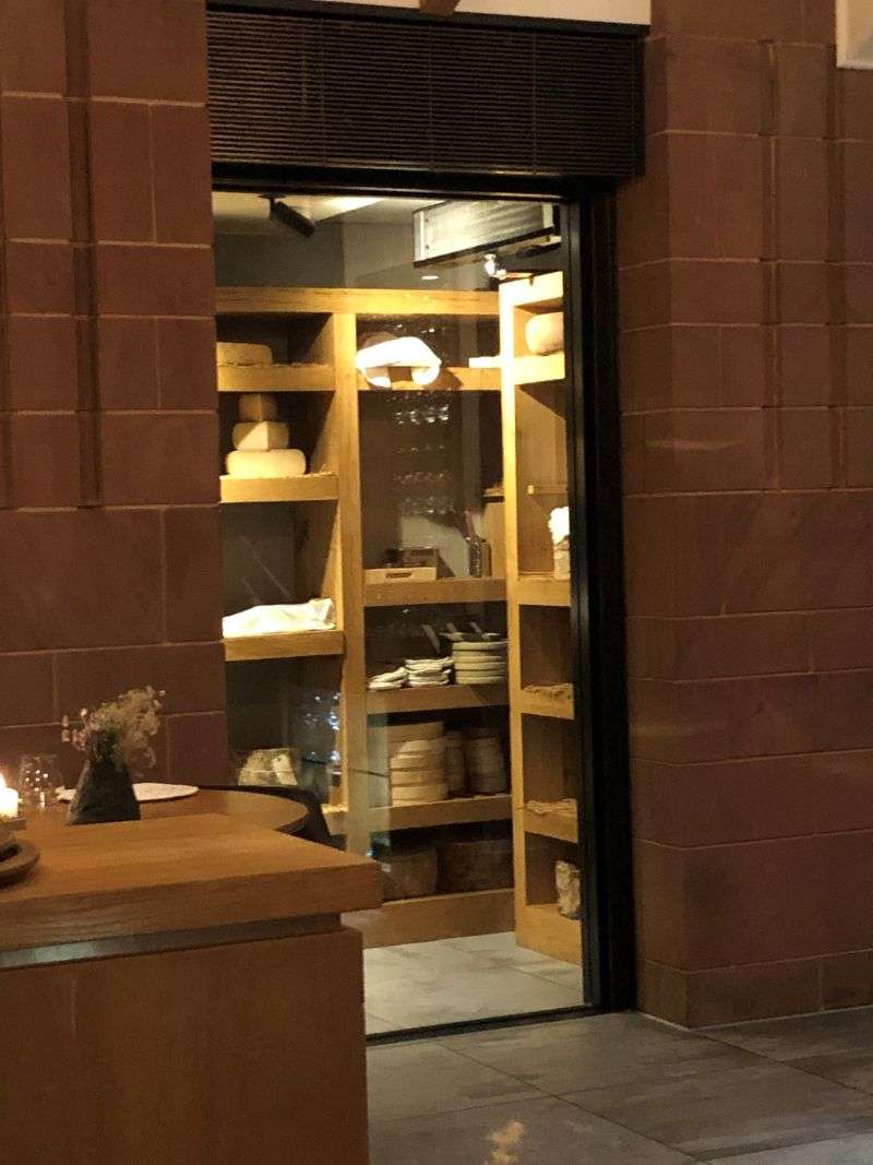 The cheese room is accessed from the restaurant