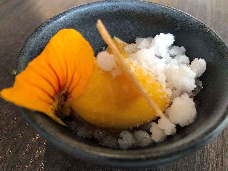 Pre-dessert of mango sorbet
