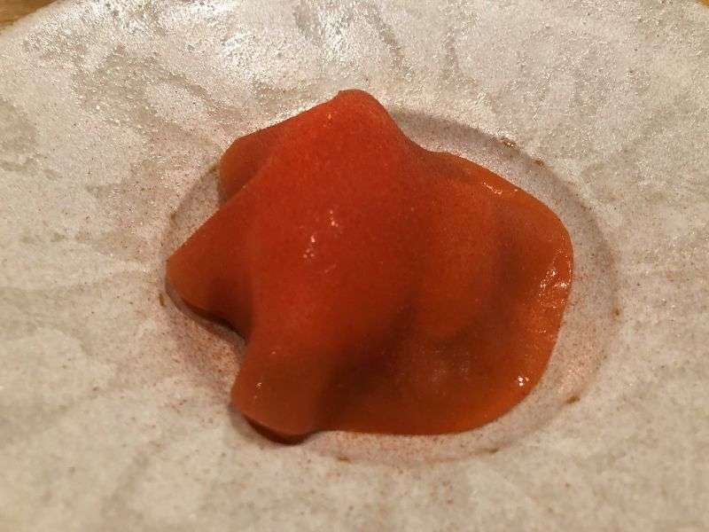 Strawberry jelly covering macerated strawberries